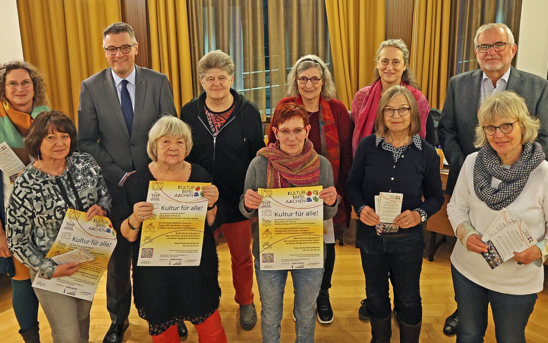 Team der Kulturtafel Aachen bei StädteRegionsrat Tim Grüttemeier.